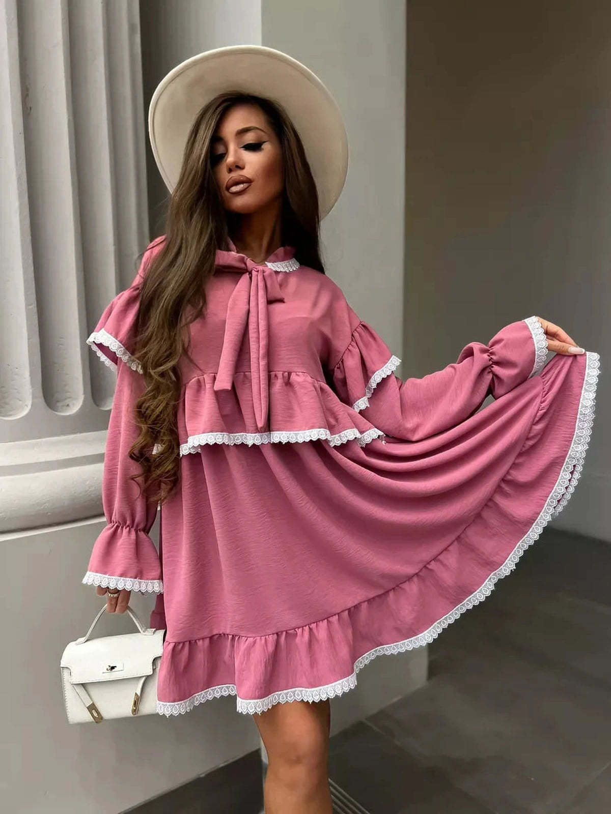 Rosea Mini Dress by Lauven featuring elegant ruffles, lace detail, and a stylish fit for modern women.