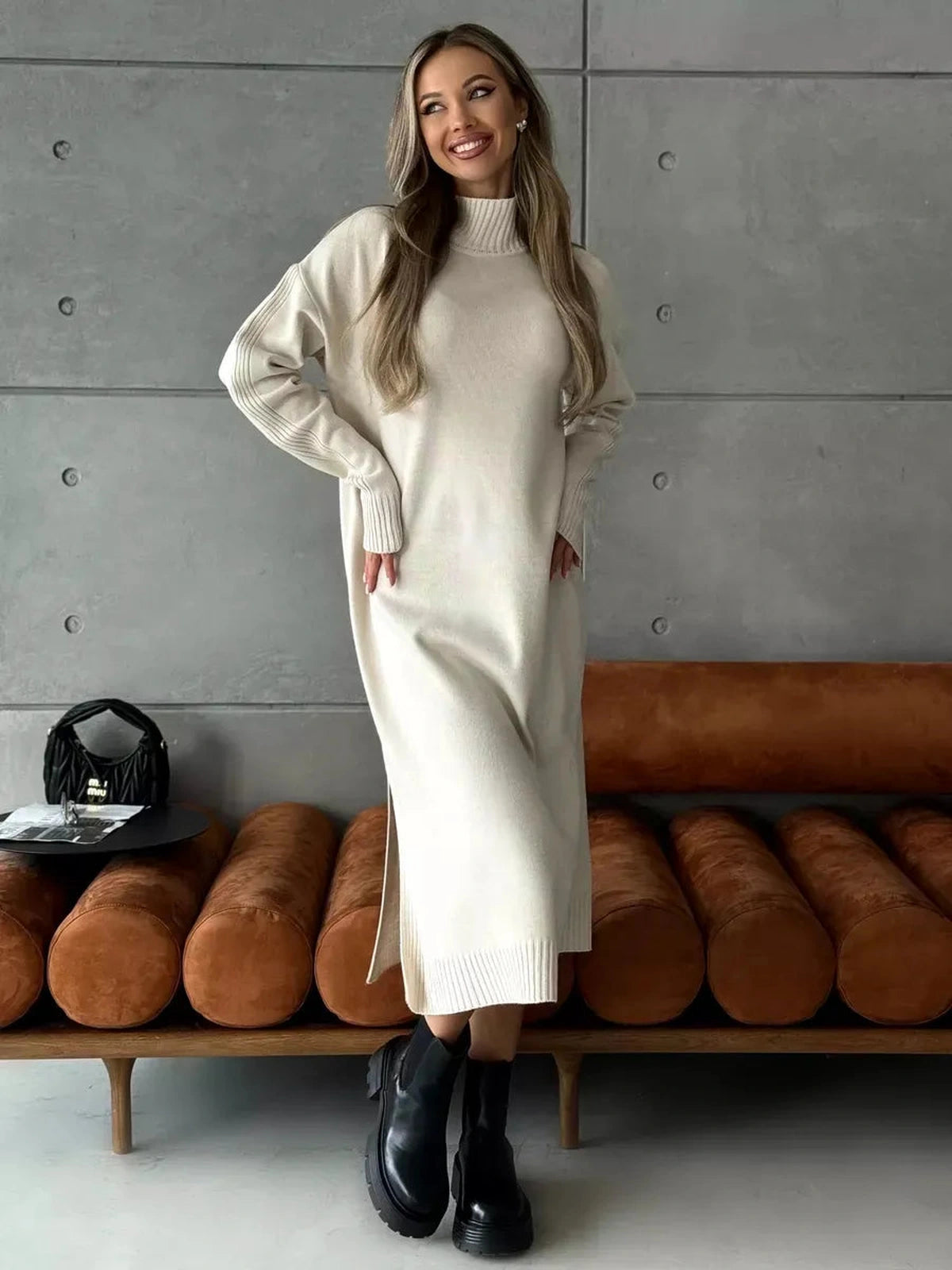 Celeste Midi Dress by Lauven, featuring a soft high neckline and relaxed silhouette in elegant beige.