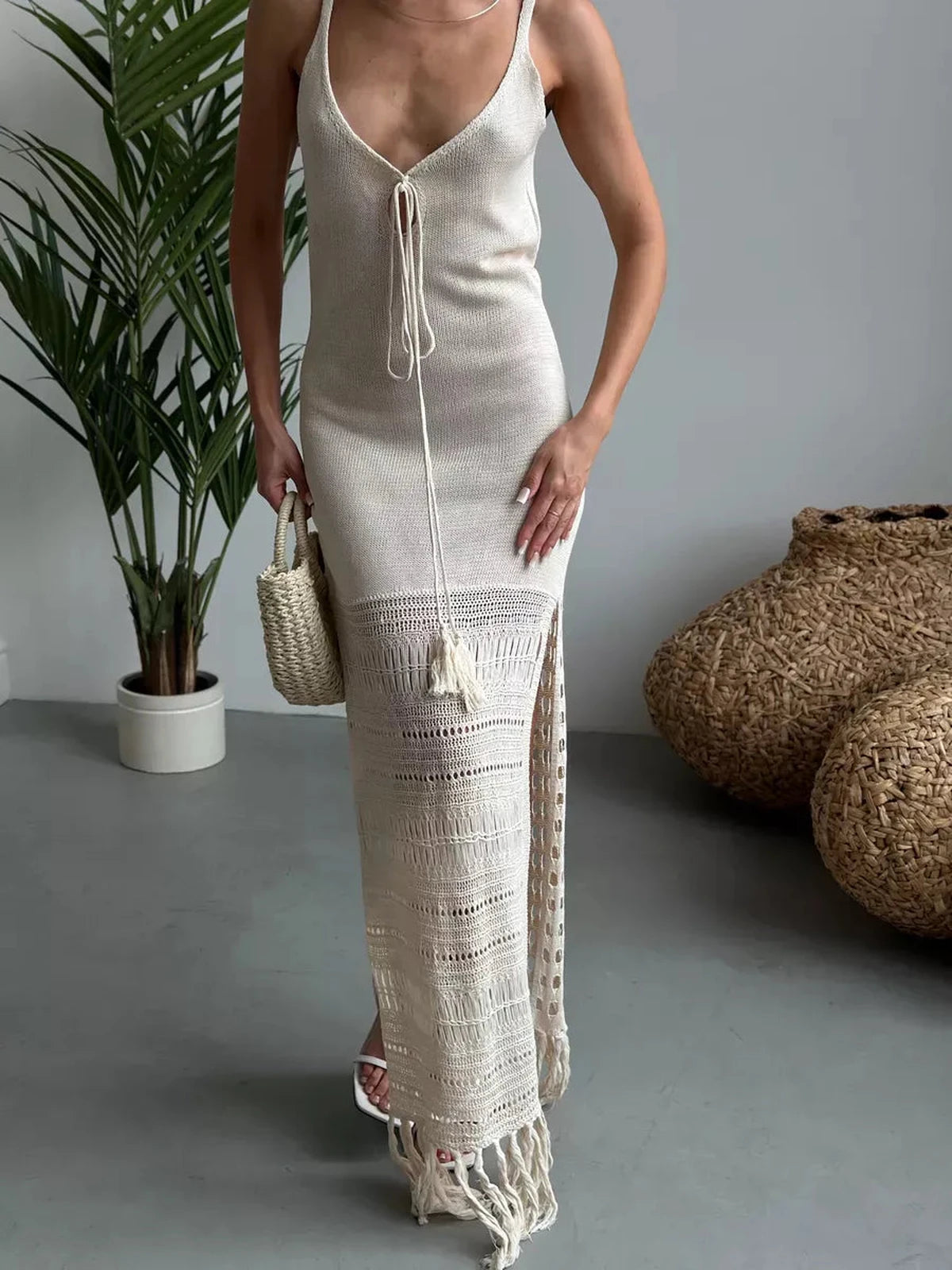 Lunara Maxi Dress by Lauven showcases soft knit texture, openwork hem, and fringe details, perfect for warm-weather elegance.