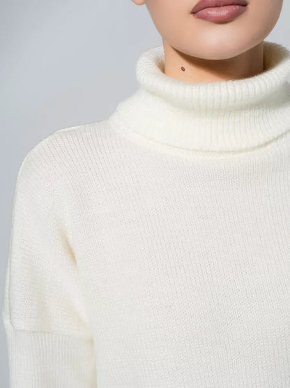 Luna Sweater by Lauven, oversized knit in soft milk white, featuring a cozy turtleneck and relaxed fit.