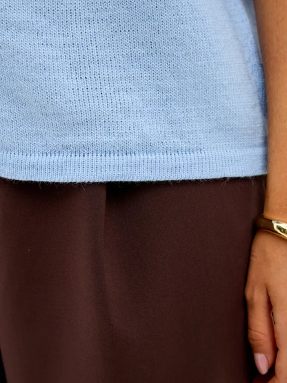 Alba Cardigan by Lauven, showing lightweight blue wool blend fabric and a relaxed fit.