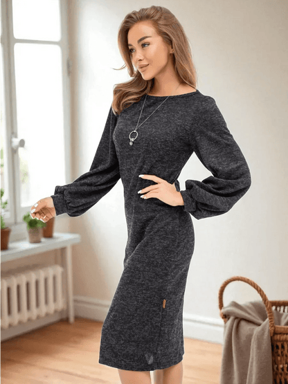 Noir Midi Dress by Lauven worn by a model in a sophisticated knit fabric, showcasing refined elegance in graphite black.