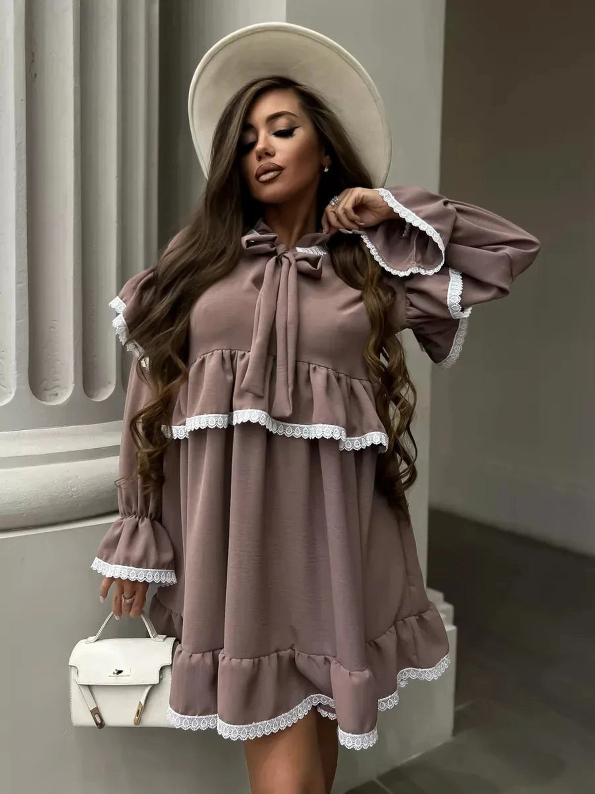 Aurora Mini Dress by Lauven, featuring soft ruffles and lace trim, ideal for elegant, comfortable styling.