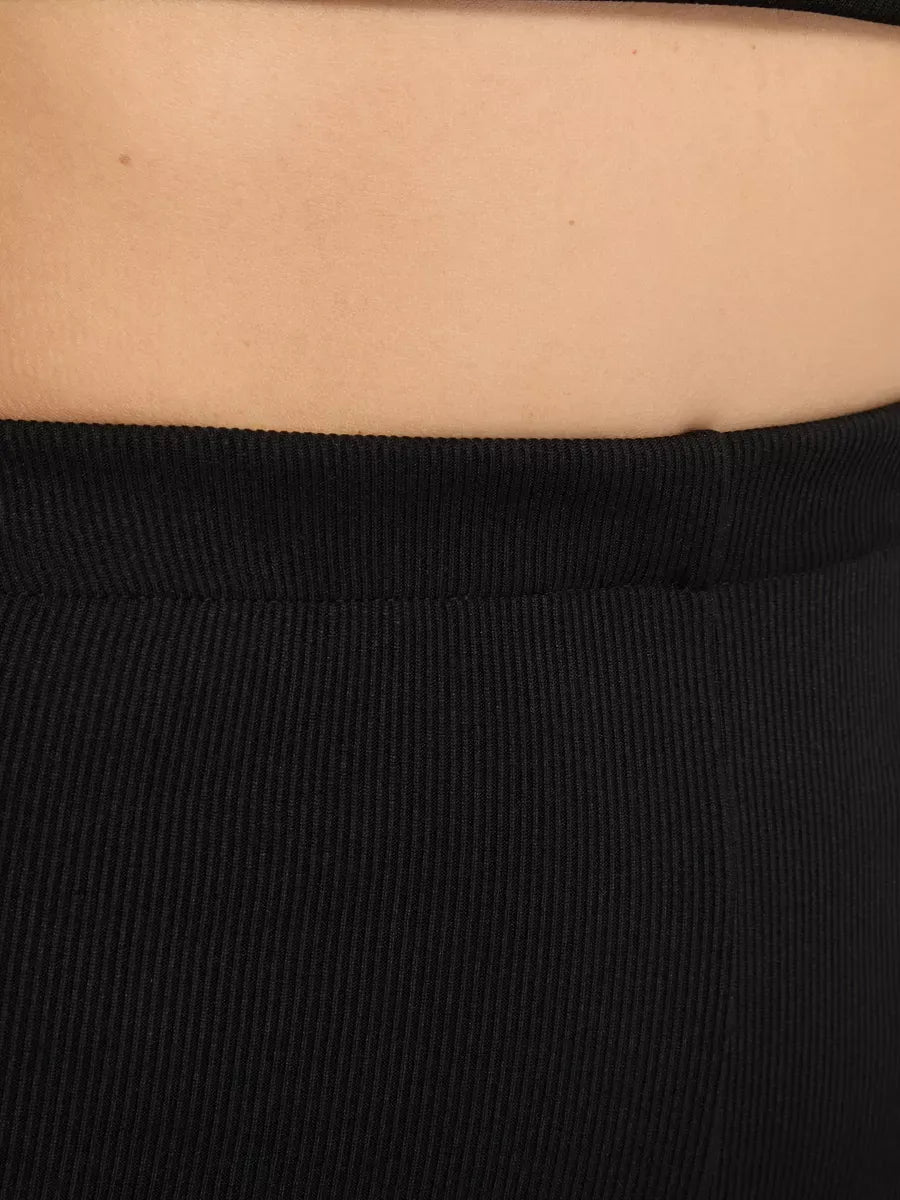 Close-up of Onyx Two-Piece Set ribbed fabric, showcasing the sleek design by Lauven.