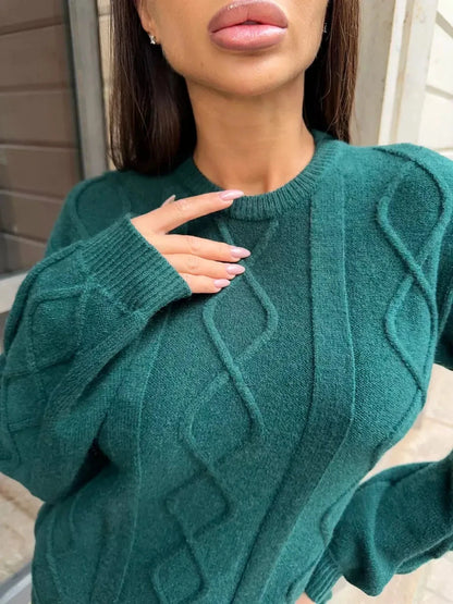 Elegant textured knit detail from the Selene Midi Dress by Lauven in emerald green.