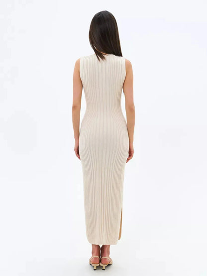 Evelyn Midi Dress by Lauven, showcasing a ribbed knit design in cream from the back.