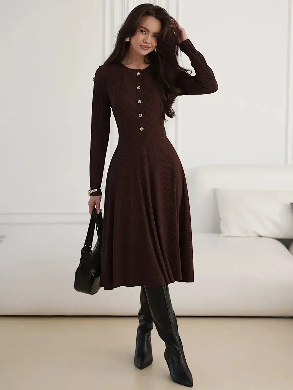Elegant brown midi dress with button detailing, fit-and-flare silhouette, and classic round neckline.