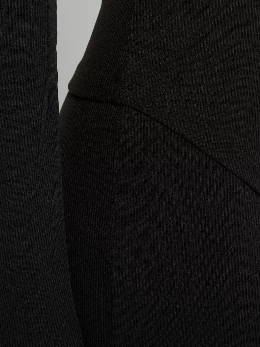 Close-up of the Onyx Two-Piece Set by Lauven, featuring luxurious ribbed fabric in black.