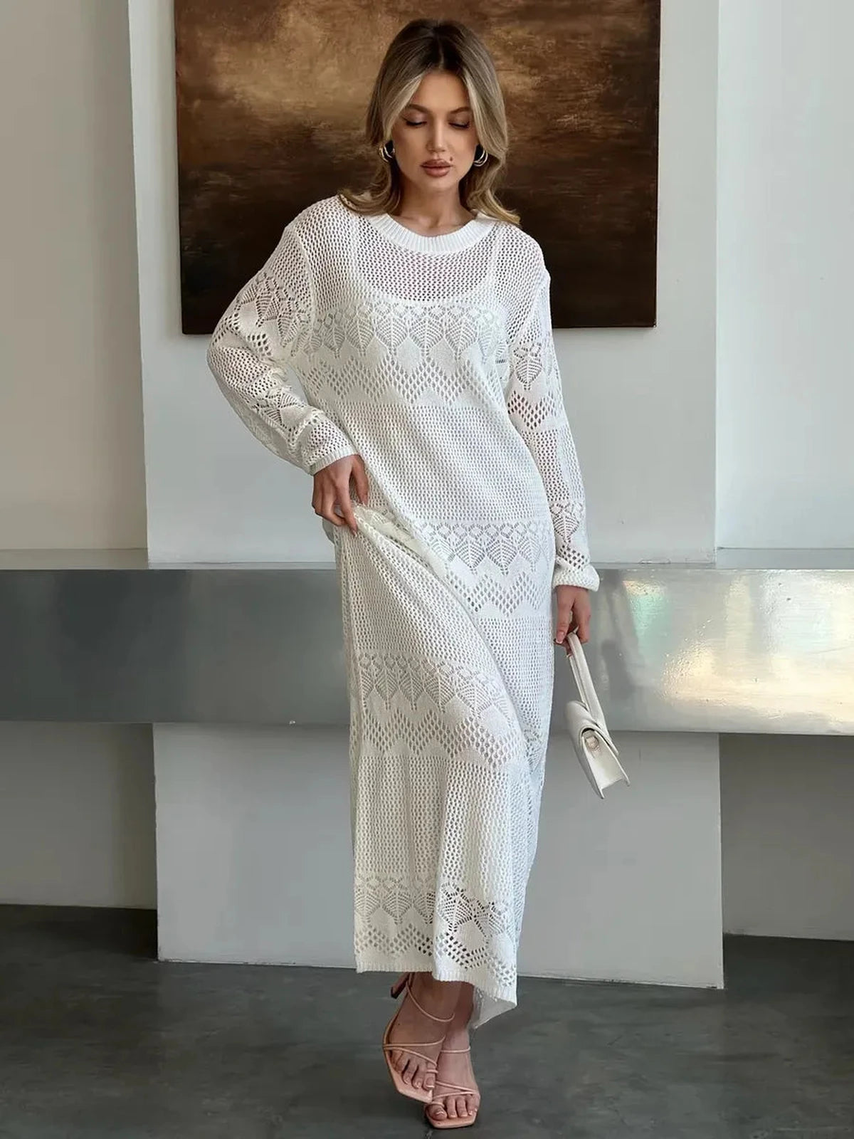 Aurelia Maxi Dress by Lauven, featuring airy crochet elegance and a modern open-knit design for summer styling.