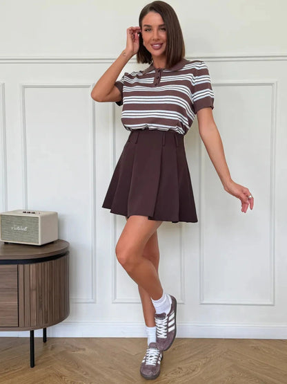 Verona Mini Skirt by Lauven - Chocolate brown pleated A-line skirt paired with a striped shirt for a chic look.