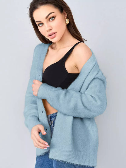 Skyler Cardigan by Lauven in soft blue oversized knitwear, featuring button closure, perfect for layering.