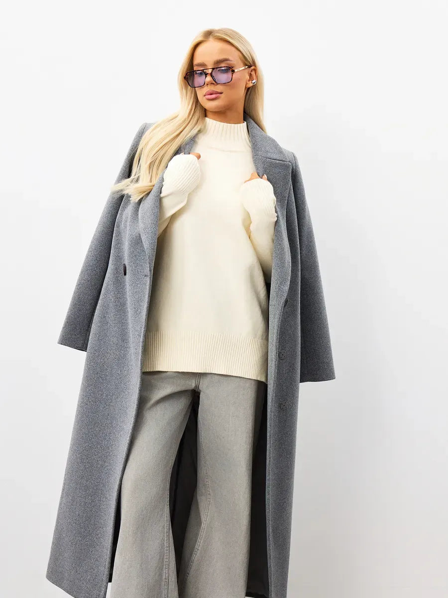 Liora Sweater by Lauven, oversized milk white cashmere knitwear styled with a gray coat and sunglasses.
