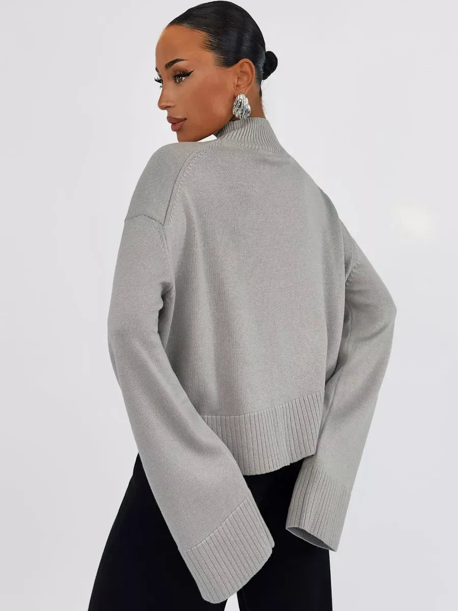 Arden Sweater by Lauven in gray, showcasing its oversized knit style and modern elegance.