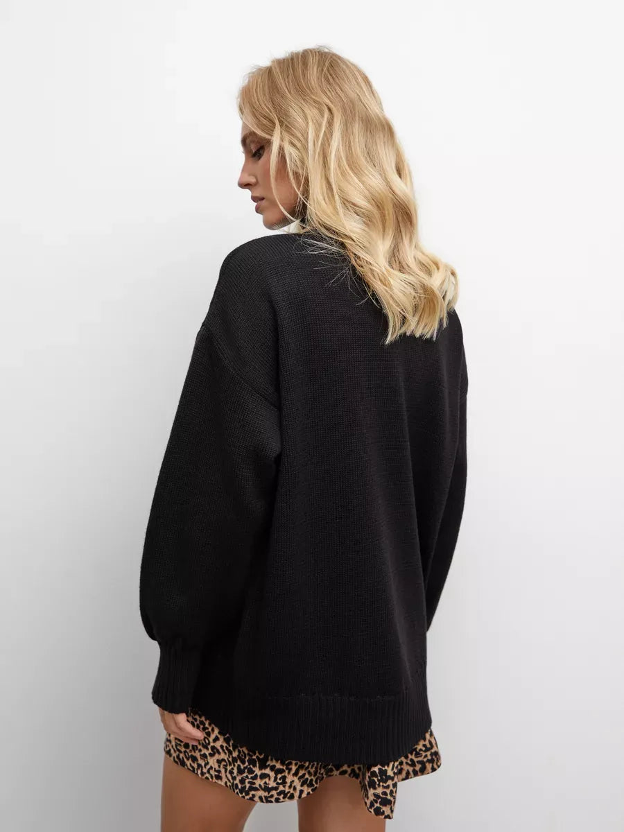 Nyra Sweater by Lauven - Oversized women’s black wool knit with high turtleneck, perfect for cooler seasons.