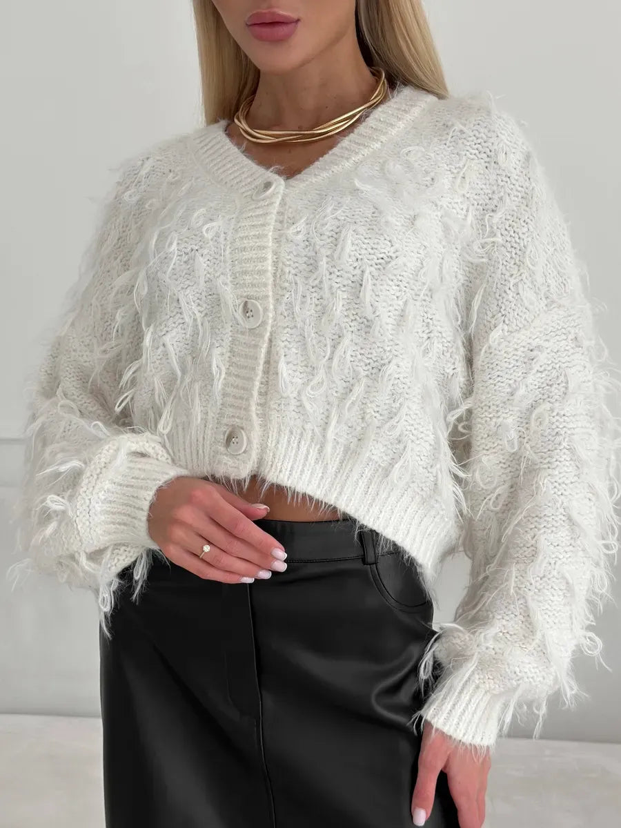 Ivory Cardigan by Lauven, cropped oversized bouclé knit with feathered fringe, stylish and cozy women's wear.