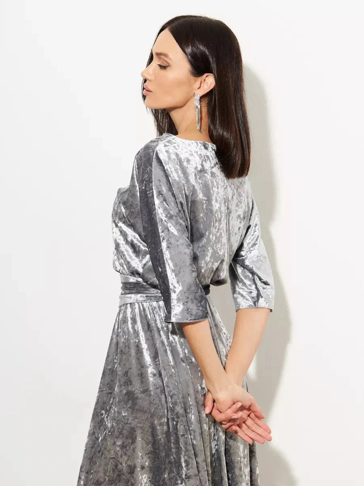 Selene Maxi Dress by Lauven, showcasing elegant silver velvet fabric and graceful back design.