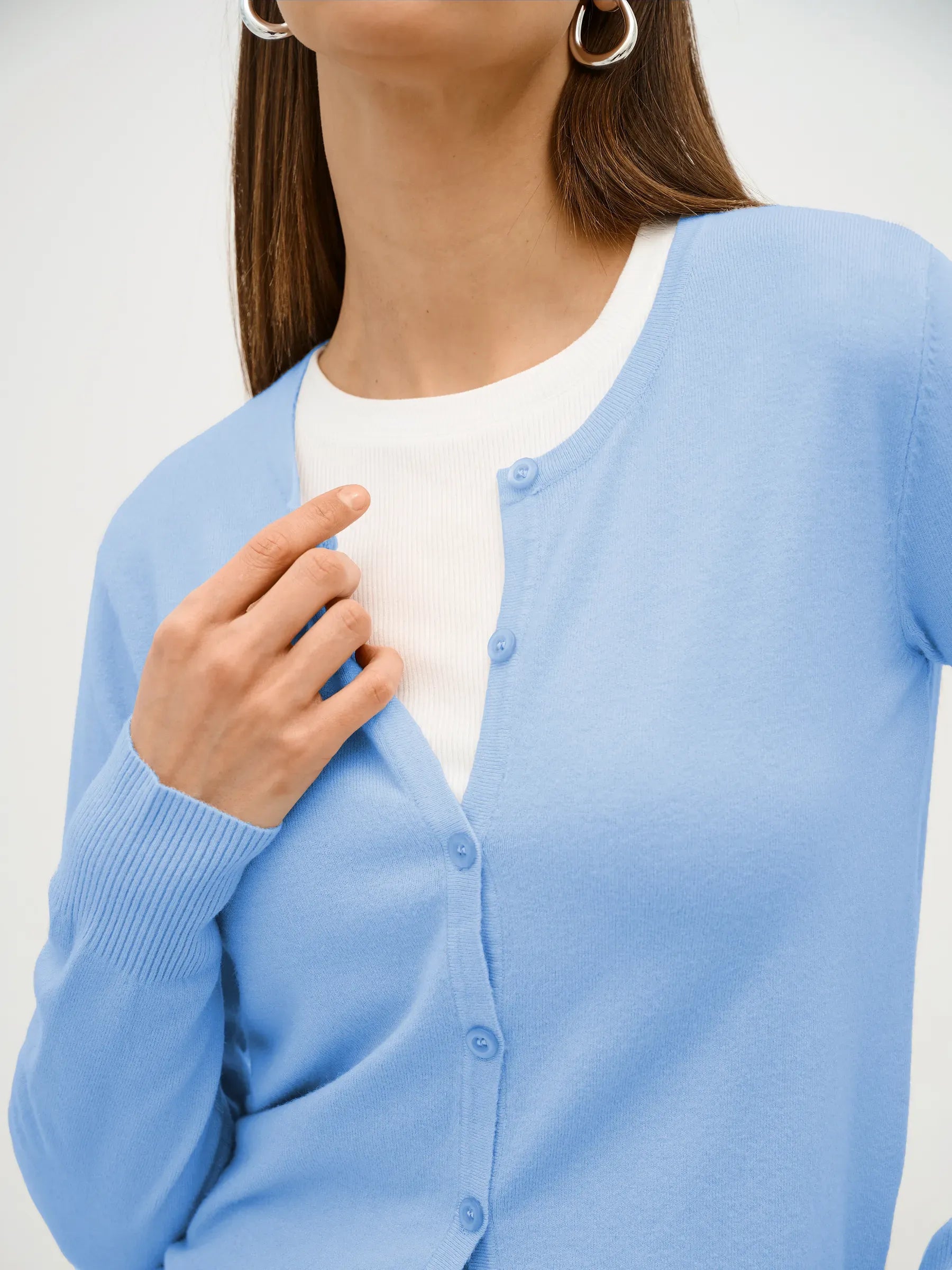 Celeste Cardigan by Lauven, featuring lightweight blue knitwear with button closure, ideal for layered looks.