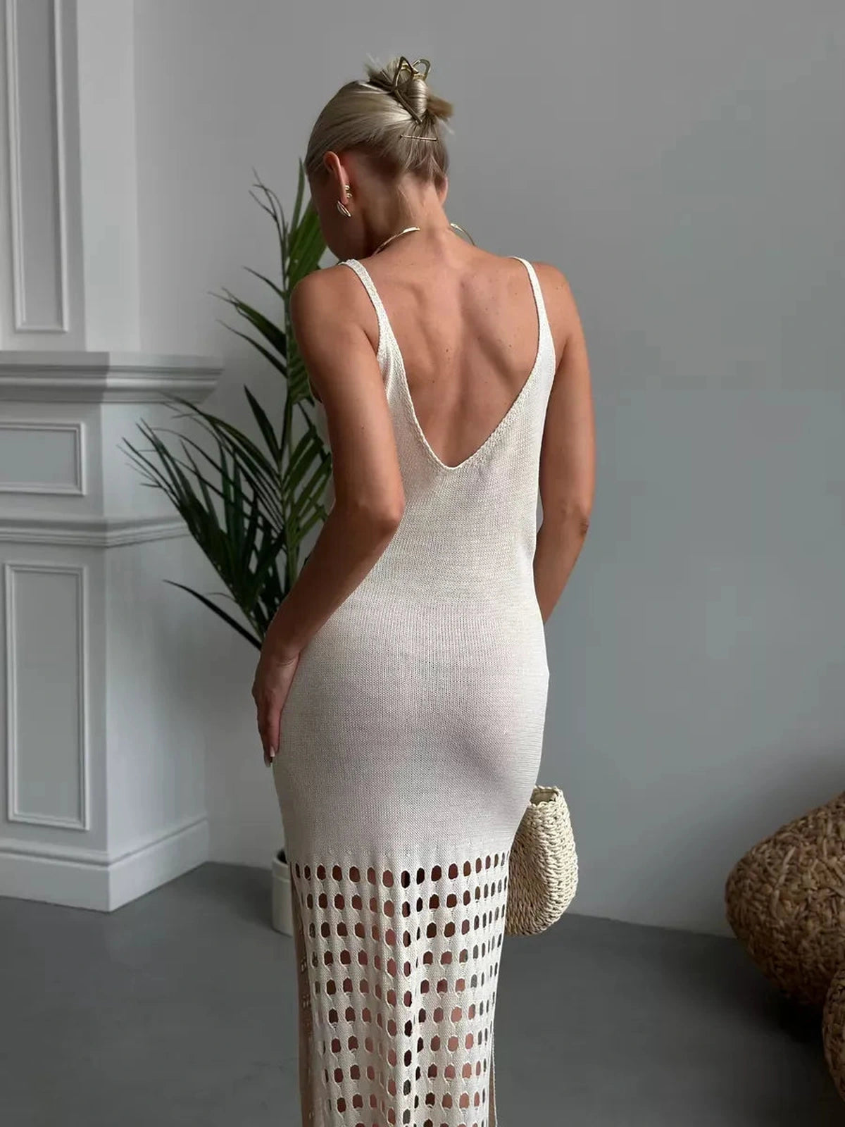 Lunara Maxi Dress by Lauven featuring soft knit texture and openwork elegance, showcasing a flowing silhouette.