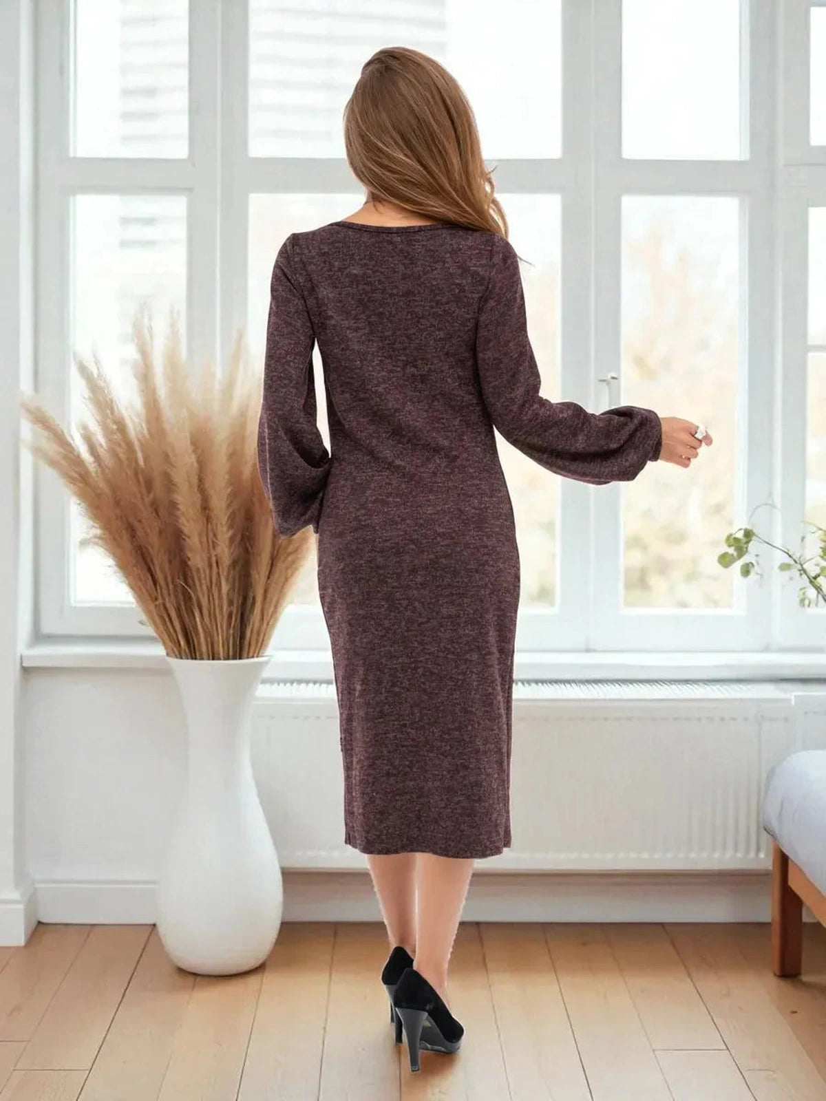 Auburn Midi Dress by Lauven showcasing elegant knit comfort and balloon sleeves from the back, perfect for any occasion.