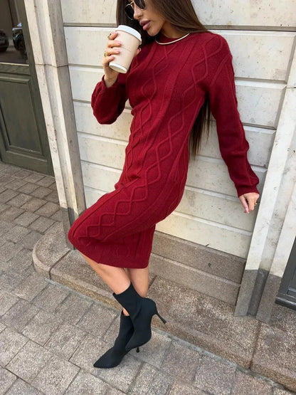 Model in a Crimson Midi Dress by Lauven, showcasing its elegant texture and cozy design for autumn.
