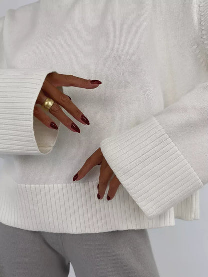 Bianca Sweater by Lauven showcasing oversized cotton blend knit in white, featuring ribbed cuffs and stylish details.
