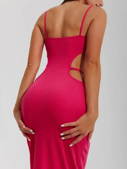 Sculpt Midi Dress in vibrant pink with sleek side cutouts showcasing a body-hugging silhouette and luxe ribbed knit fabric.