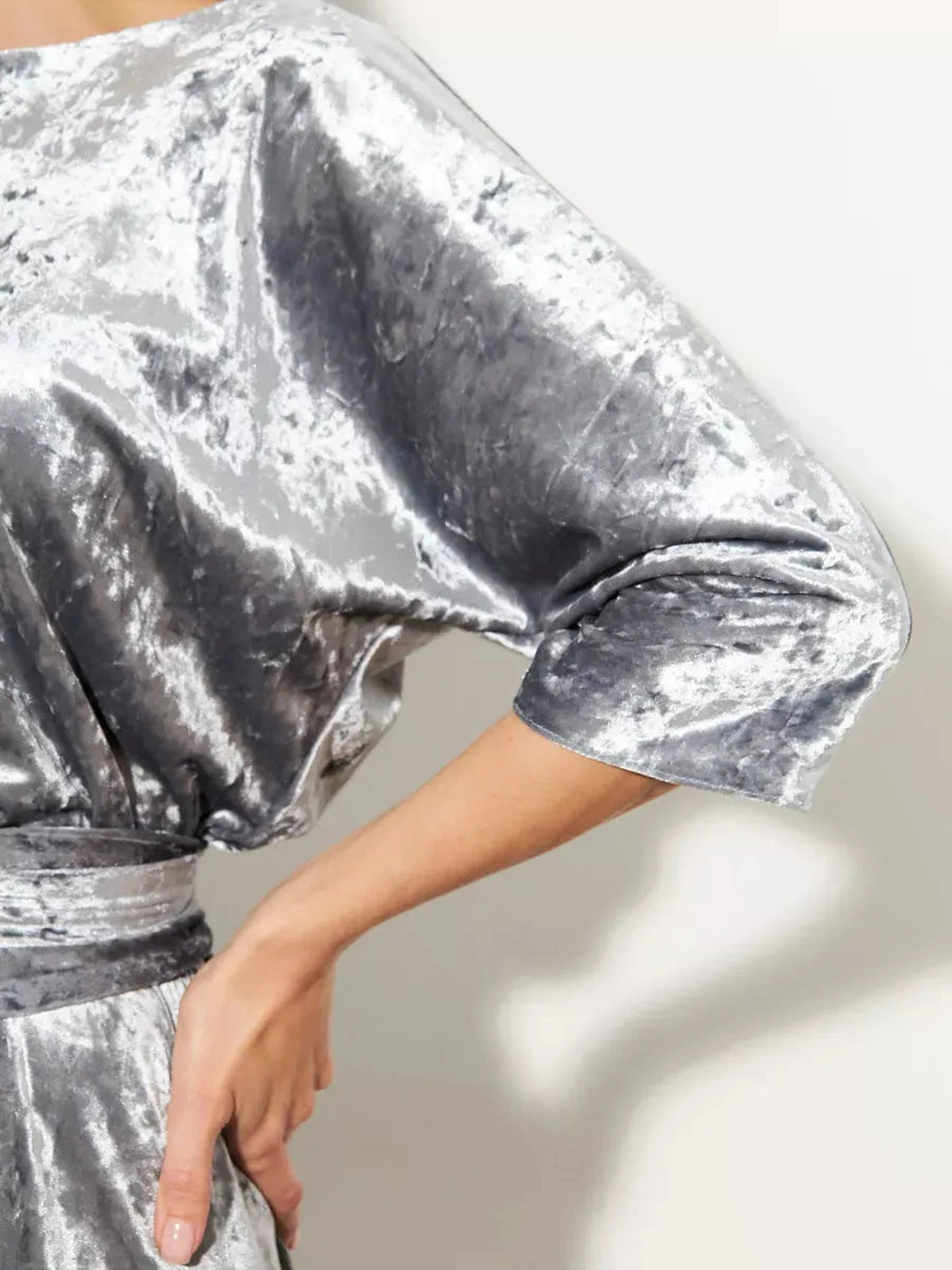 Selene Maxi Dress by Lauven showcasing the elegant silver velvet fabric and draped sleeves detail.