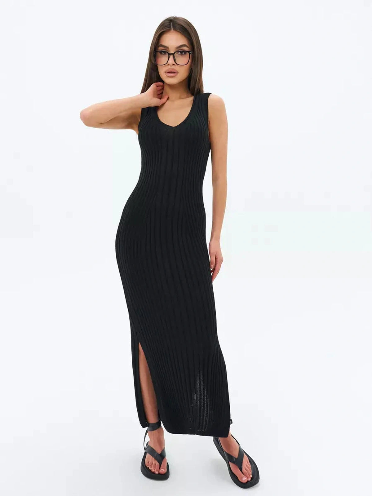 Noir Midi Dress by Lauven, a timeless black ribbed knit dress with a flattering V-neckline and side slit.
