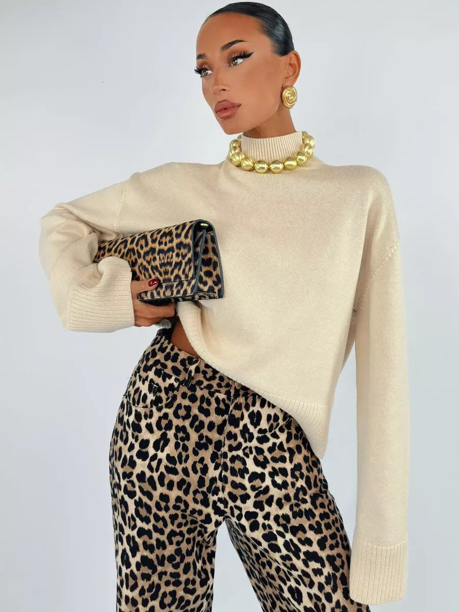 Eterna Sweater by Lauven, oversized light beige cotton blend knit paired with leopard print pants.