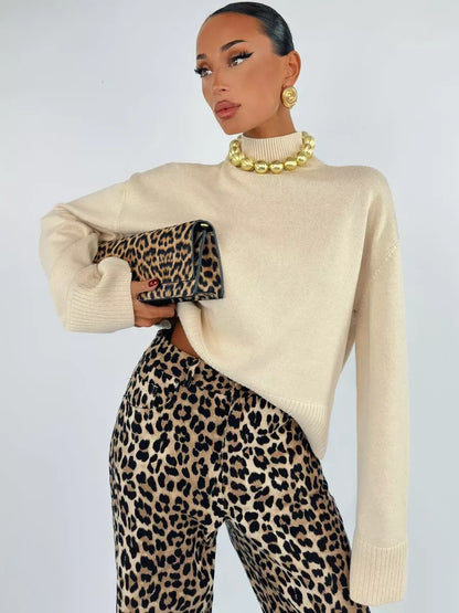 Eterna Sweater by Lauven, oversized light beige cotton blend knit paired with leopard print pants.