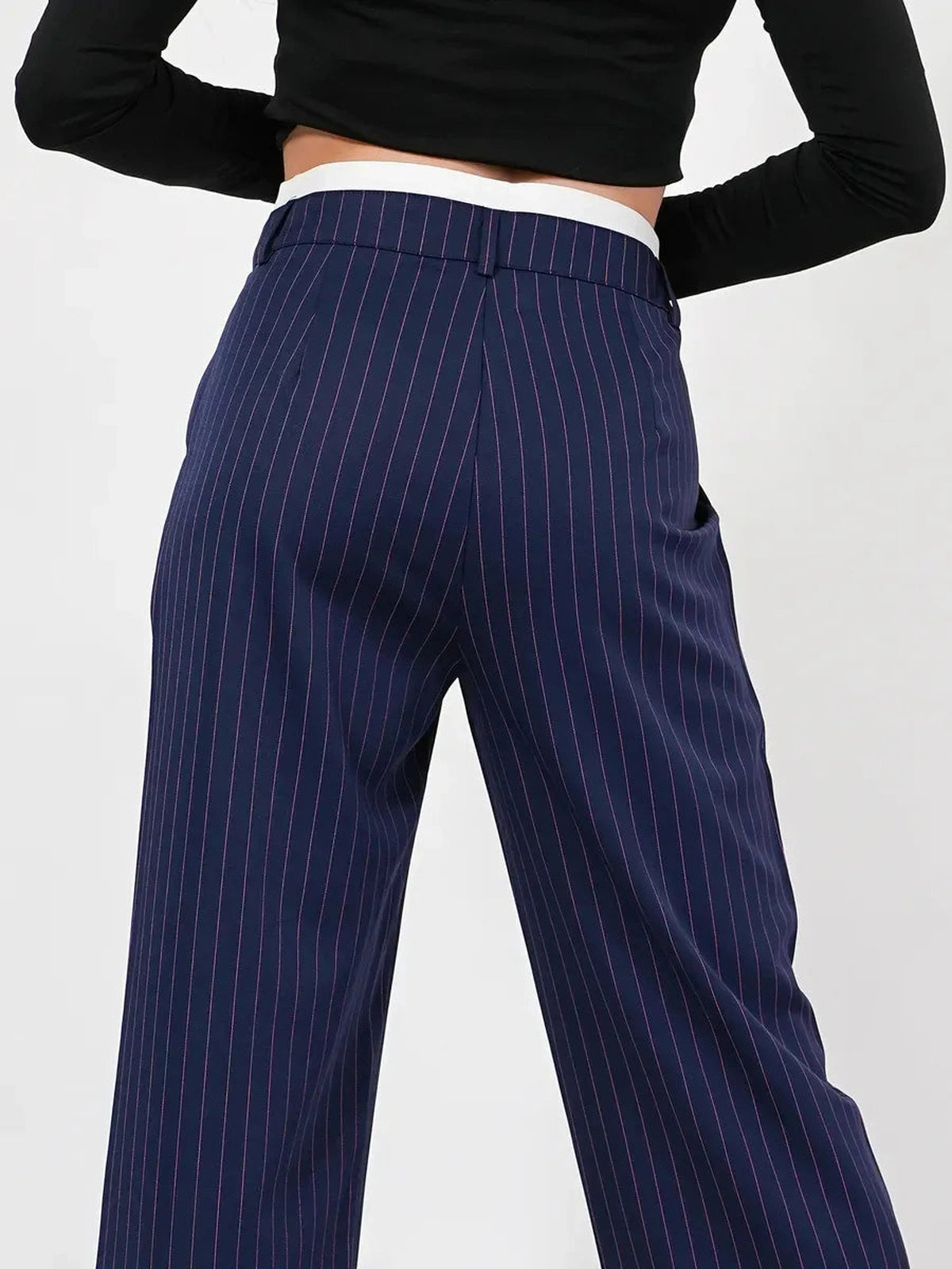 Aster Pants featuring a refined high-waist wide-leg silhouette in elegant navy pinstripes by Lauven.