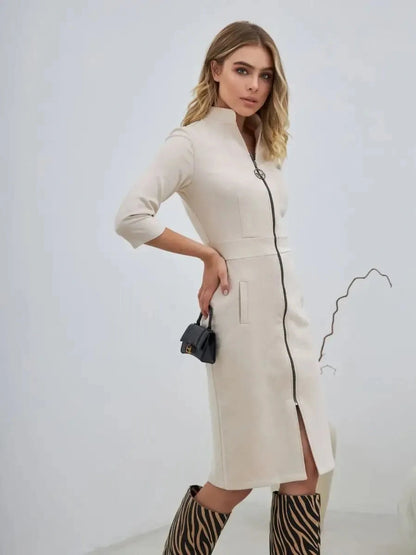 Model wearing the Sedona Mini Dress by Lauven, featuring a zip-front design and sculpted silhouette.