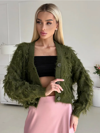 Olive Cardigan by Lauven, a cropped oversized khaki bouclé knit with feathered fringe detailing.