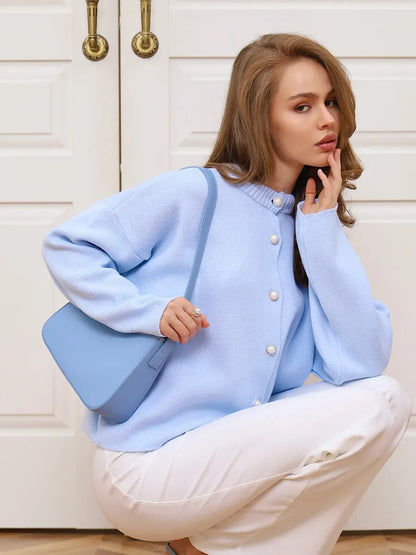 Skyline Cardigan by Lauven, warm light blue knitwear with button closure, perfect for casual and office wear.