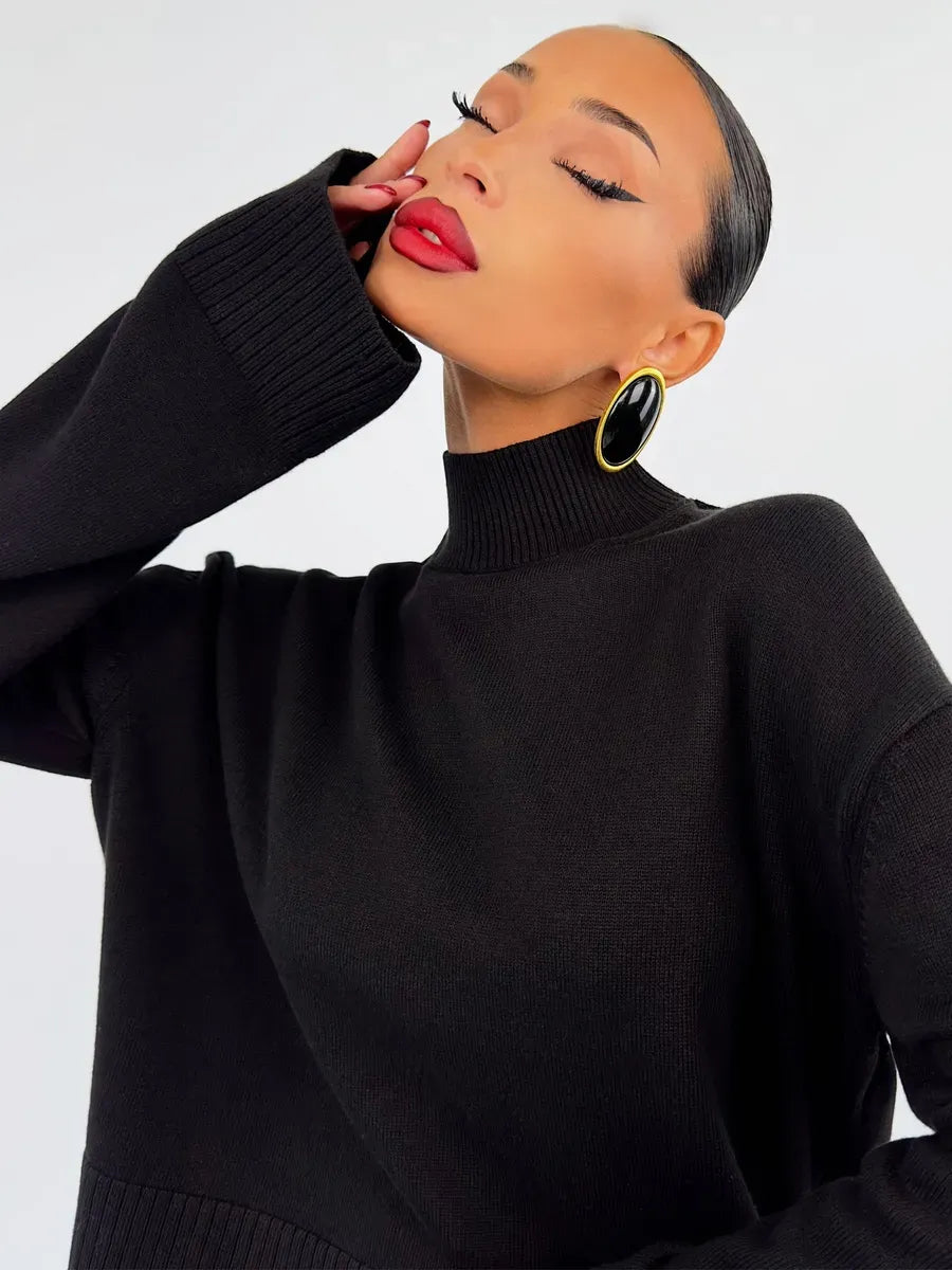 Noir Sweater by Lauven, an oversized cotton blend black knit, showcasing elegance and contemporary design.