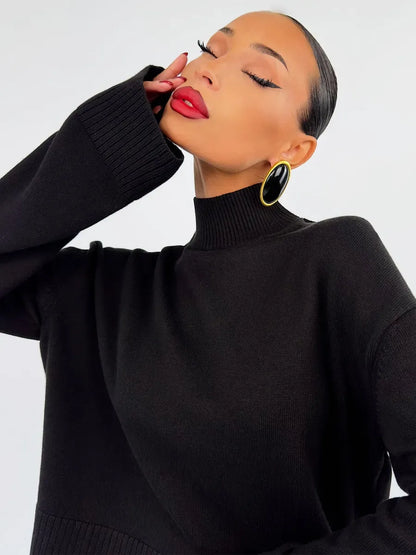 Noir Sweater by Lauven, an oversized cotton blend black knit, showcasing elegance and contemporary design.