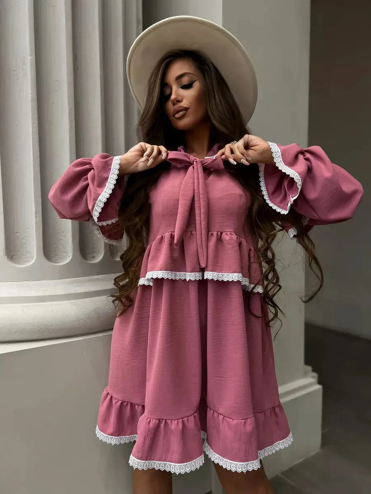 Rosea Mini Dress by Lauven featuring elegant ruffles and lace details, designed for sophistication and comfort.