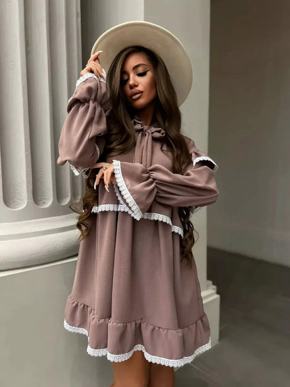 Aurora Mini Dress by Lauven featuring soft ruffles and delicate lace trim, perfect for effortless elegance.