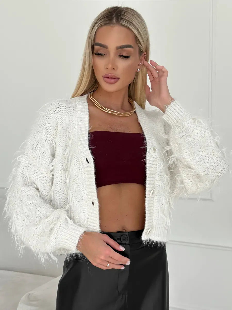 Ivory Cardigan by Lauven, cropped oversized bouclé knit with feathered fringe, featuring a relaxed fit and V-neckline.