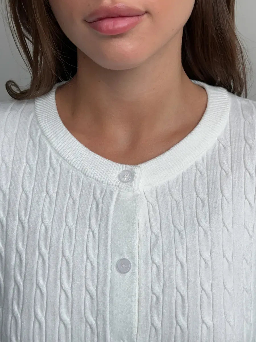 Ivory Cardigan by Lauven, featuring a lightweight cable knit design and soft button-up front.