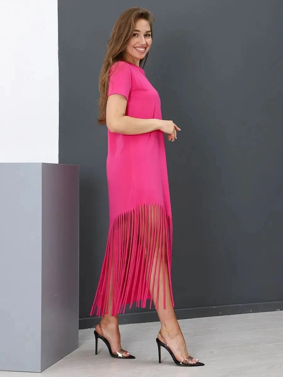 Capri Midi Dress by Lauven, fuchsia cotton jersey dress with fringe hem and elegant silhouette.