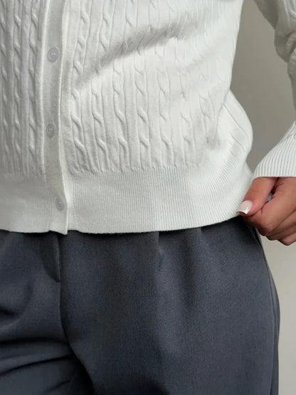 Ivory Cardigan by Lauven, showcasing lightweight cable knit texture and stylish fit with buttons and ribbed details.