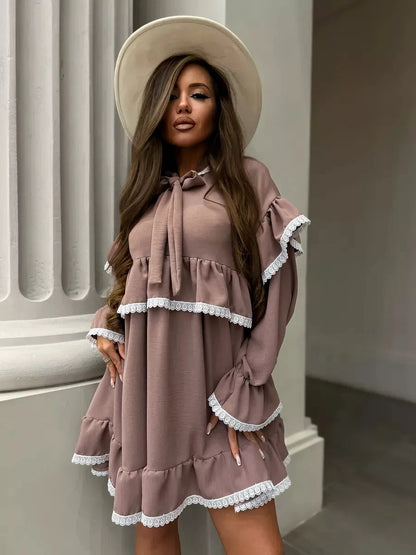 Aurora Mini Dress by Lauven featuring soft ruffles and delicate lace trim, perfect for stylish women.