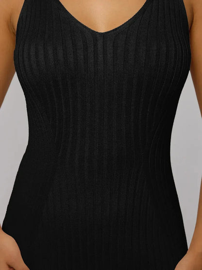 Close-up of the Noir Maxi Dress by Lauven, showcasing the sleek black ribbed knit design and flattering fit.