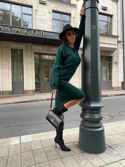 Selene Midi Dress by Lauven, elegant emerald textured knit sweater dress worn outdoors.