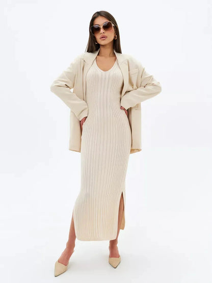 Evelyn Midi Dress from Lauven, a cream ribbed knit dress with side slits, perfect for elegant styling.