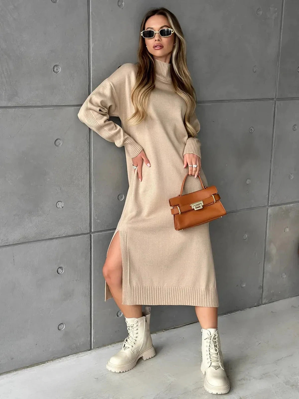 Seren Midi Dress by Lauven showcasing a minimalist knit design in classic beige with a side slit, perfect for autumn style.