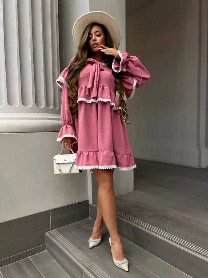 Rosea Mini Dress by Lauven featuring elegant ruffles and lace detail, perfect for modern feminine sophistication.