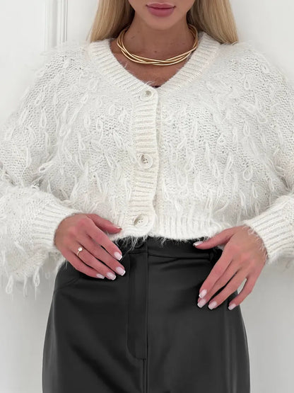 Ivory Cardigan by Lauven, cropped oversized bouclé knit with feathered fringe, showcasing cozy style and comfort.