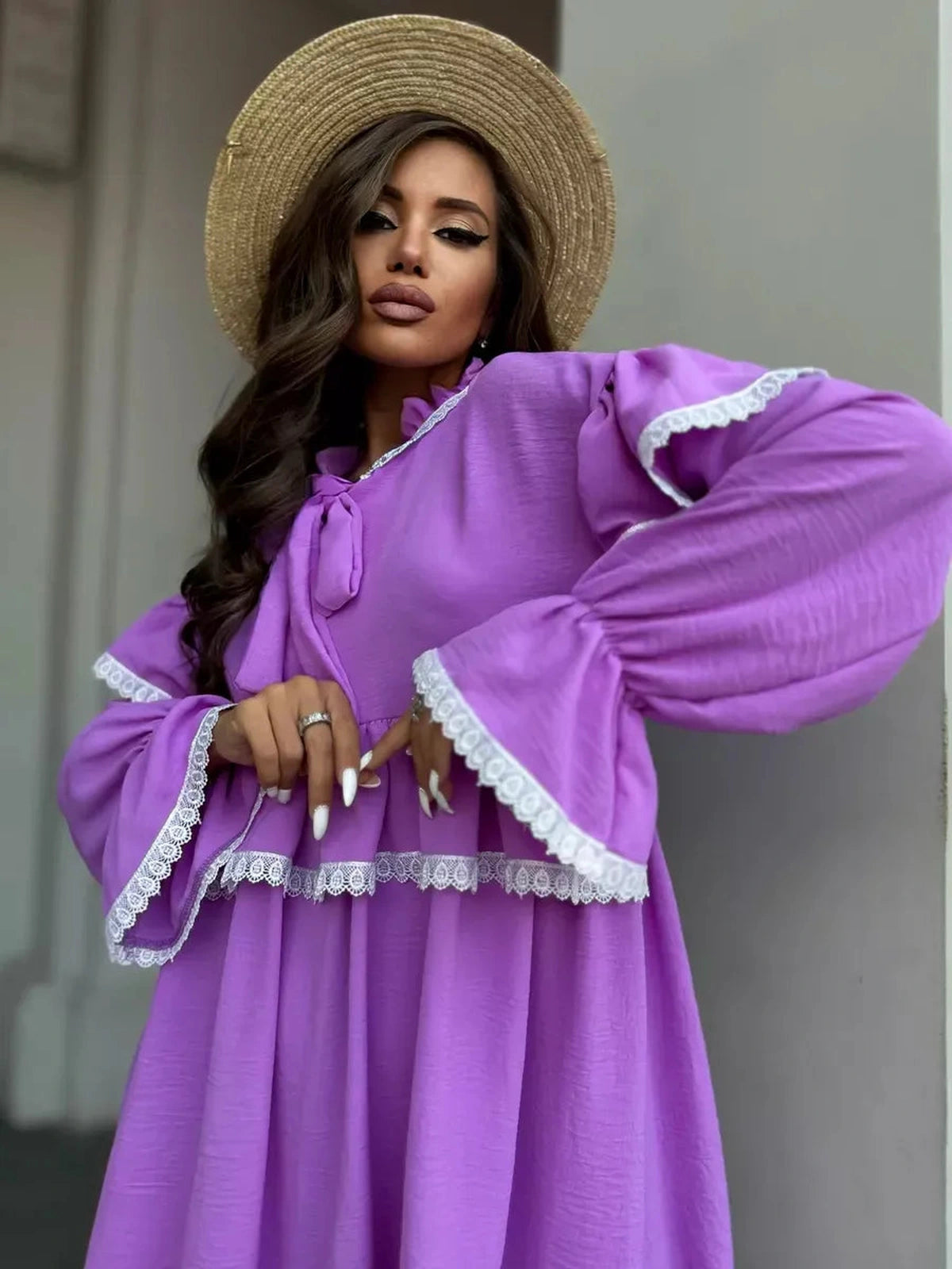 Violetta Mini Dress by Lauven, featuring delicate lace and flowing ruffles in a lilac color.